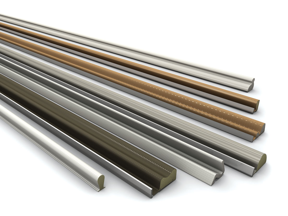 Assorted metal trim and sealing profiles in silver, bronze and dark finishes