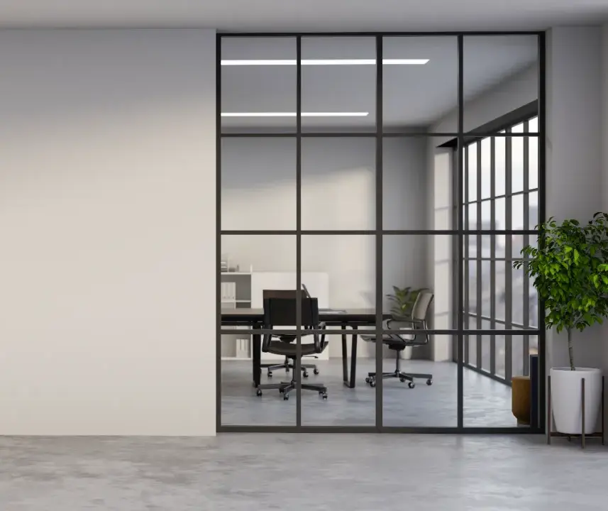 black-framed glazed office partition enclosing a modern meeting room.
